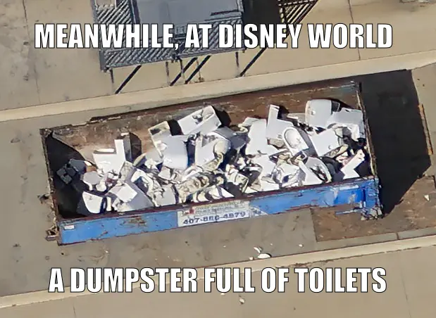 Ariel photo of a dumpster filled with broken toilets. Top text: Meanwhile, at Disney World. Bottom text: A dumpster full of toilets.