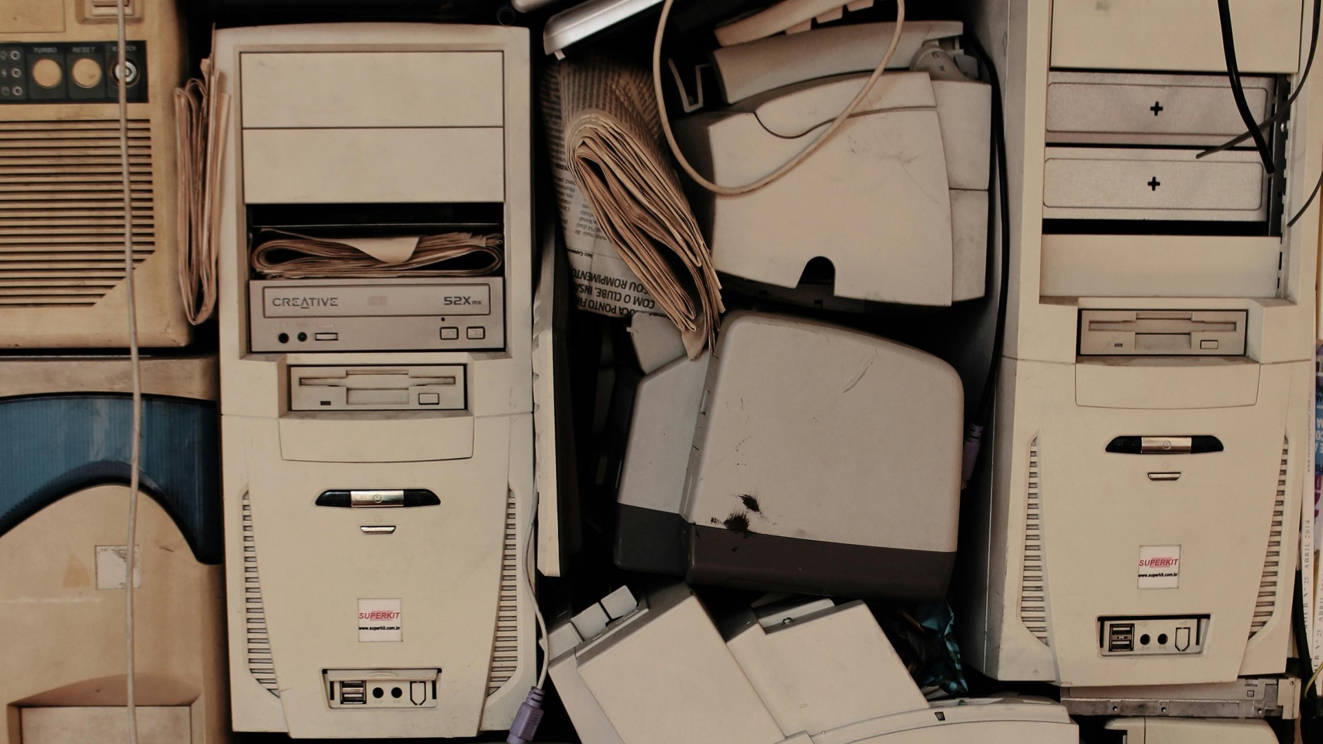 A pile of old, broken computers.