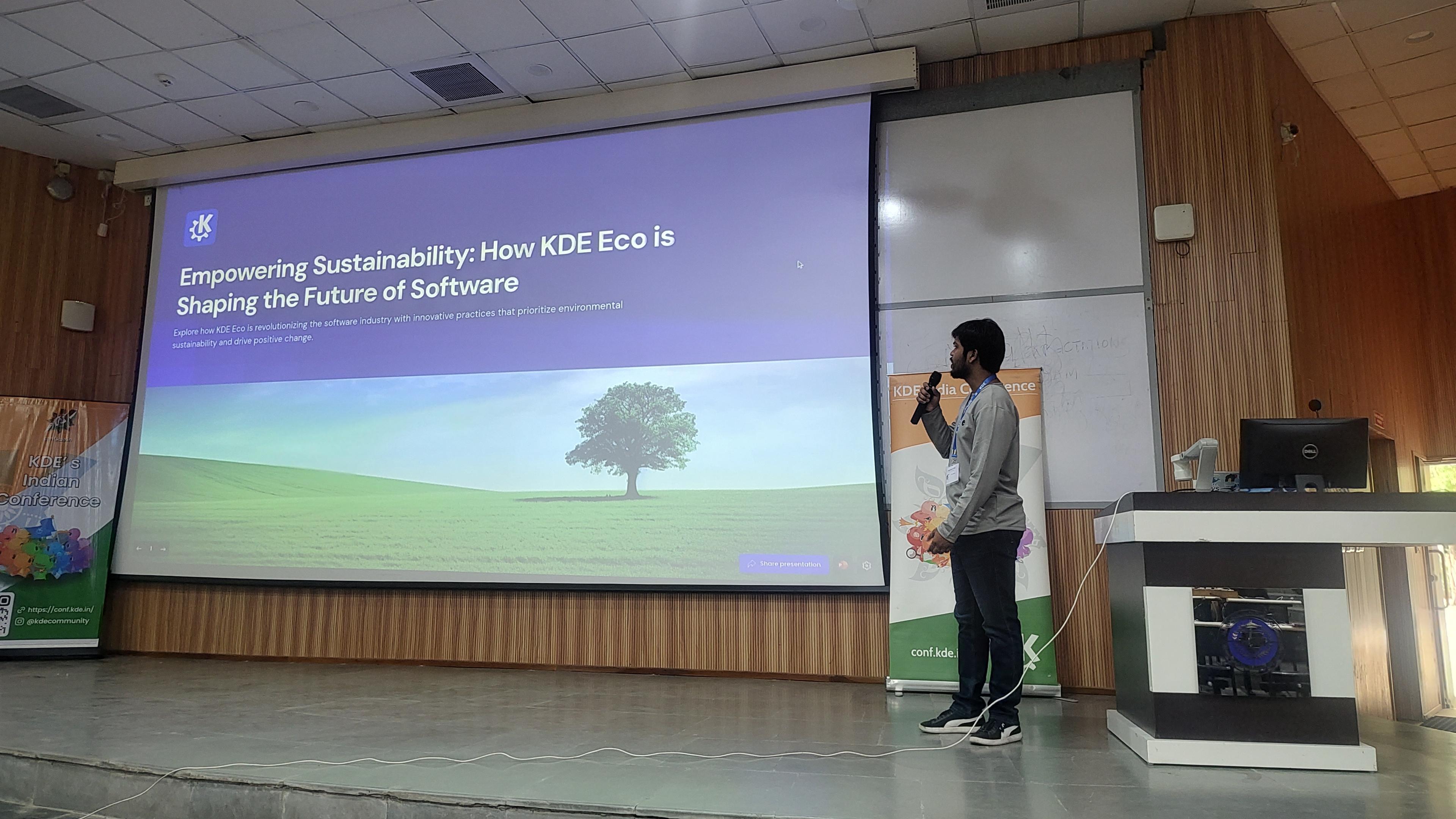 Speakers giving presentation about KDE Eco.