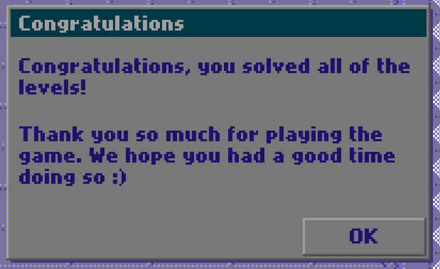 puzzle game end message screenshot saying "Congratulations, you solved all of the levels! Thank you so much for playing the game. We hope you had a good time doing so :)"